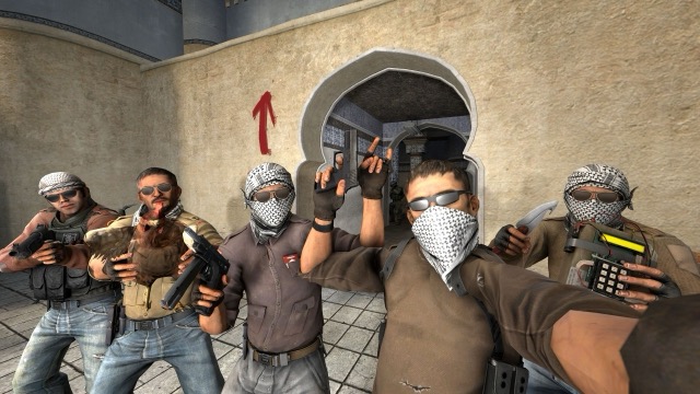 A full CS:GO terrorist team posing together on Mirage, ready for a match