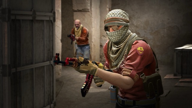 Two terrorists with a skinned AK-47 pushing an alley in classic CS:GO